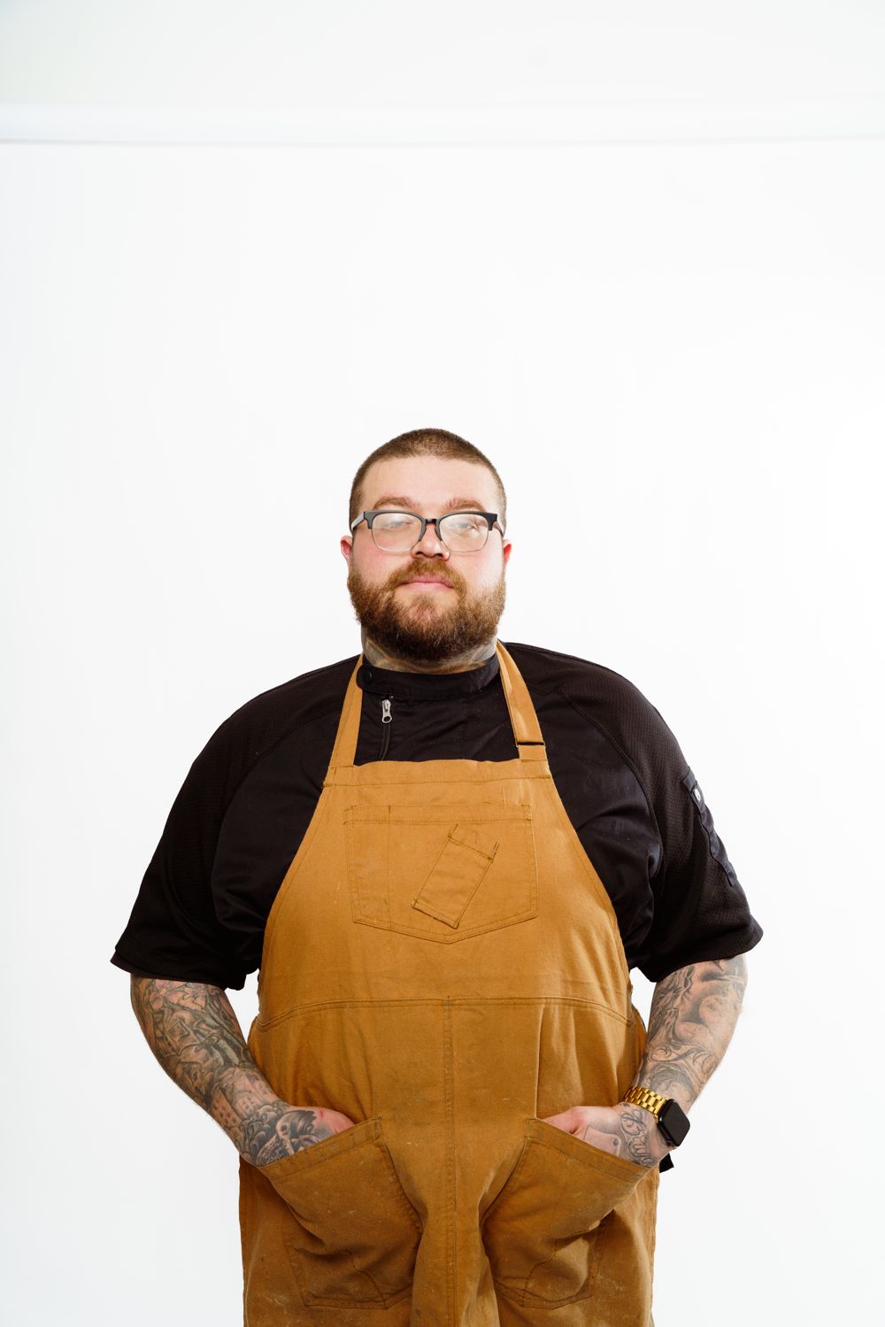Ryan Lane, founder of Culinary Curators, in a canvas apron